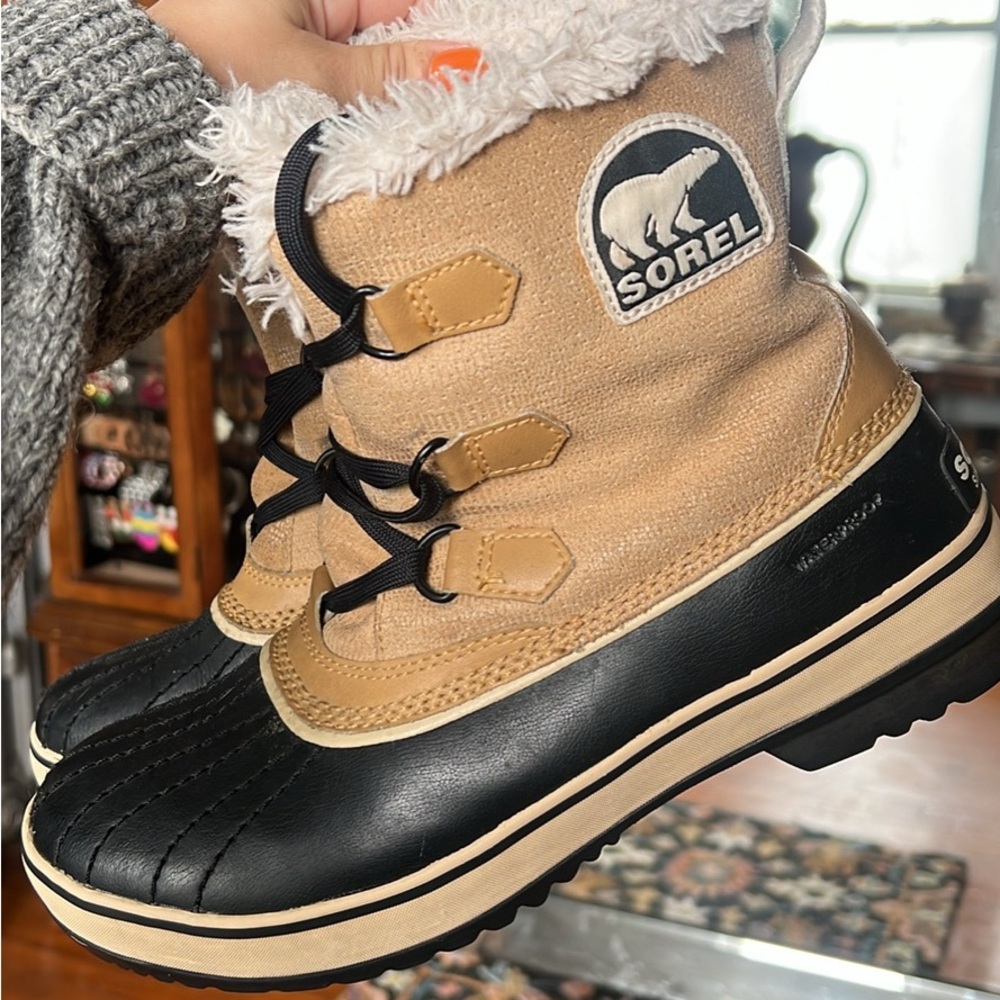 Sorel Tan and Black Winter Boots